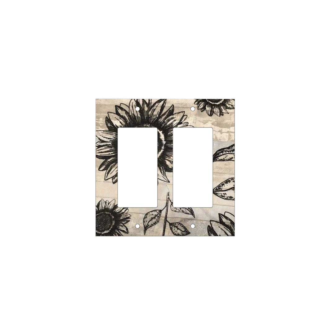 Handmade decorative light switch cover with bold black sunflowers on rustic beige woodgrain fabric, perfect for farmhouse and boho home décor