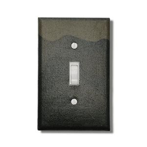 Handmade Outdoor Combat Legacy decorative light switch cover featuring green and brown woodland camouflage pattern—military and hunting switch plates from Black-owned home décor.