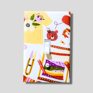 Handmade Creative Heart decorative light switch plate featuring illustrated craft supplies, cute bear, scissors, thread, buttons, and ribbons in yellow, orange, and pink—craft room switch plates from Black-owned home décor.