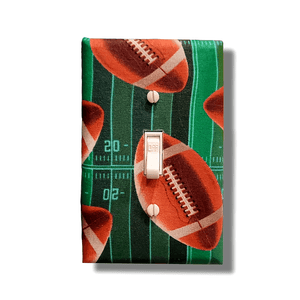 Handmade Fantasy Football Field of Dreams decorative light switch cover featuring realistic football field with yard lines and footballs—game day switch plates from Black-owned home décor.