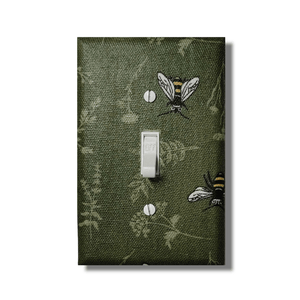 Garden keeper bee fabric switch cover with embroidered bees on sage green botanical leaf pattern, handmade by Black-owned Kustom Kreationz by Kila