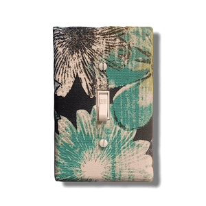 Palm breeze fabric switch cover with teal-green and cream palm fronds on tropical print, available in all configurations, handmade by Black-owned Kustom Kreationz by Kila