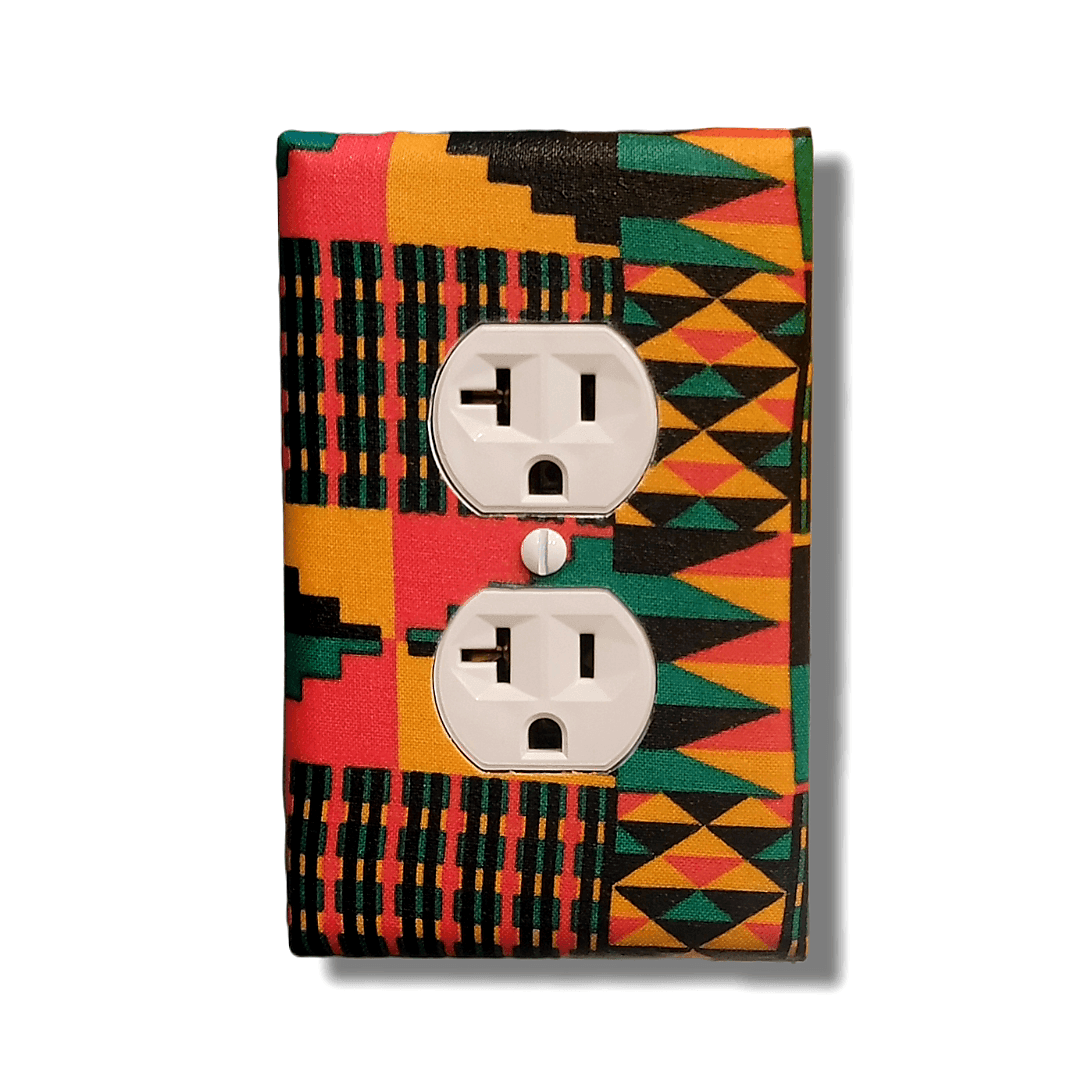 Handmade light switch cover with kente-inspired stepped staircase pattern in forest green, vibrant red, golden orange, and black featuring traditional African ascent symbolism and vertical weaving stripes for cultural heritage home décor