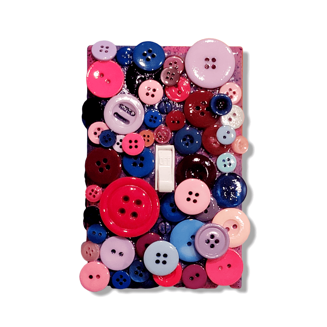 Berry sorbet button treasure vintage switch plate with glossy and matte buttons in hot pink, lavender, navy blue, burgundy and purple tones, handmade by Black-owned Kustom Kreationz by Kila