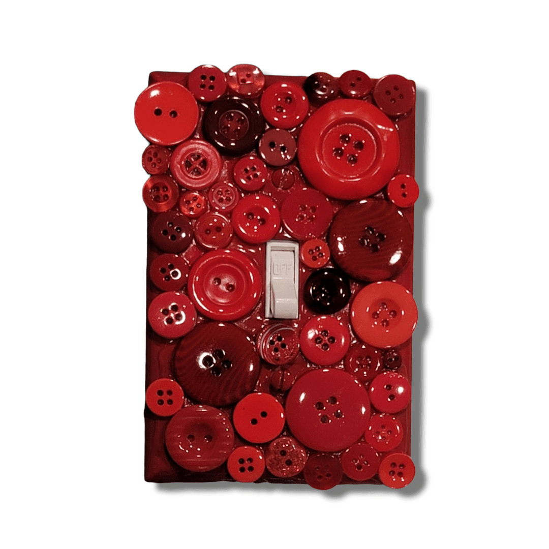 Red velvet button treasure vintage switch plate with glossy and matte buttons in cherry red, burgundy, wine and deep red tones, handmade by Black-owned Kustom Kreationz by Kila Kila